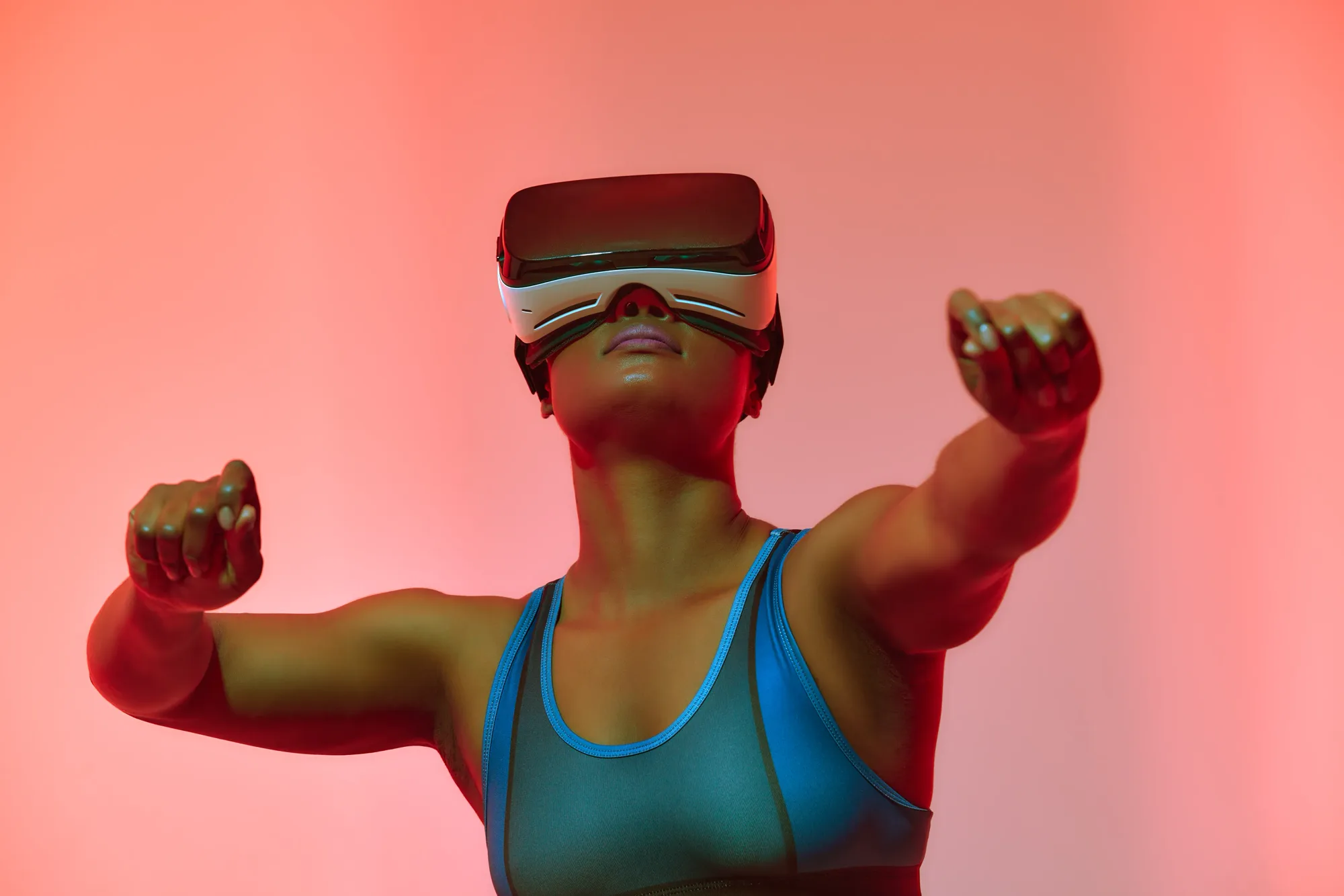 An athlete wearing a VR headset, reaching forward